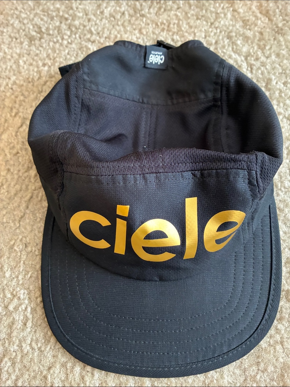 Ciele Black Performance Cap with Gold Logo